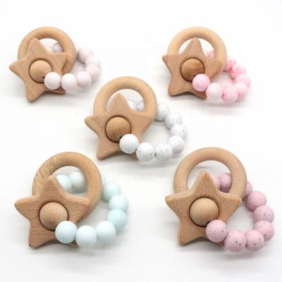 China Non-Toxic BPA Free Baby Safe Pain Relief Teether Ring Teething Beads Silicone Bracelet With Wooden Ring And Star for sale