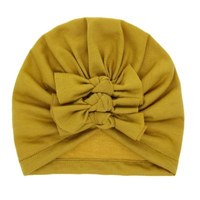 China Spandex Toddler Plain Color Soft Cotton/Cotton Turban Overflowed Tying Messy Bow Sweater Hats Cowl Headwear Hat for sale