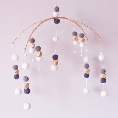 China Creative Toy Wooden Wind Chime Nursery Decoration Baby Pendant Mobile Toy Felt Ball Bed Bell Soft Crib Mobile Jewelry for sale