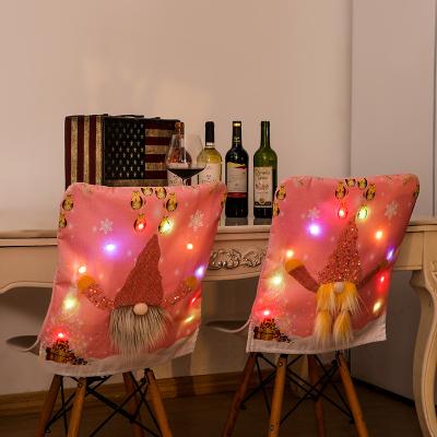 China Christmas Hot Pink Christamas Home Decoration Sale Doll Gnome Chair Canvas Faceless Cover with Lights for Christmas Home Hotel Decoration for sale