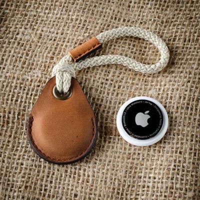 China 2021 Shockproof Vegetable-tanned Crazy Airtag Case Cowhide Horse Key Chain Biodegradable Genuine Leather Airtag Holder Plug for sale