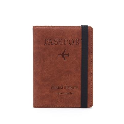 China Custom Personalized RFID Passport Blocking Genuine Leather Men Travel Wallet Cover Fold Passport Wallet Colorful Card Holder for sale