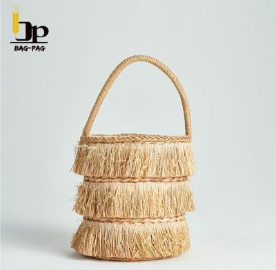 China High Quality Moroccan Wholesale Designer Woven Beach Bag Storage Handmade Raffia Tassel Basket With Handle for sale