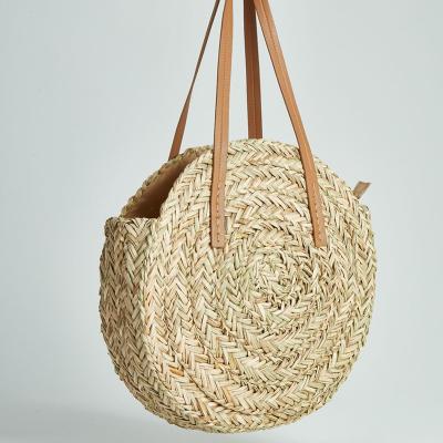 China 100% Eco-friendly Handcrafted Round Wicker Rattan Bag Straw Handbag Summer Beach Bag Seagrass Bag for sale