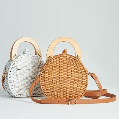 China 100% eco-friendly 2019 new camel color rattan handle bags woven single shoulder slanted bags straw bags for sale