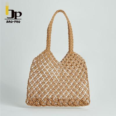 China 100% eco-friendly fashion top quality hollow crochet straw bags paper handbags for sale