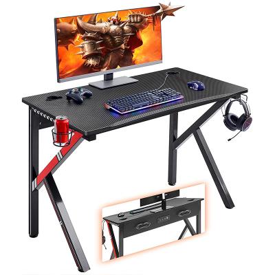 China (Height) Adjustable Gamer Workstation With Plug K Shaped Home Office PC Computer Table for sale