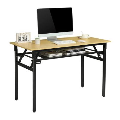 China FOLDABLE Folding Computer Desk for Small Spaces Student Writing Desk Study Foldable Table with Storage Layer for Home Office for sale