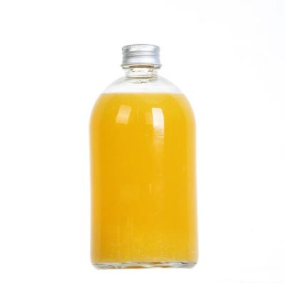 China Custom Beverage Wholesale Recycled Empty Clear Glass Juice Bottle With Metal Cap for sale