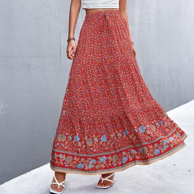 China New Women Rayon Skirt Lady Bohemian Style Casual Breathable Vacation Long Maxi Tassel Elastic Waist Floral Print Skirt for sale