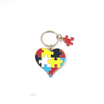 China Wholesale Folk Art Autism Awareness Love Heart Shape With Puzzle Pieces Key Chain for sale