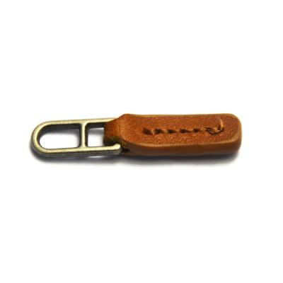 China Other Custom Brand Embossed Genuine Leather Logo Leather Zipper Puller Wholesale Garment Accessories Zipper Pulls Slider Low MOQ for sale