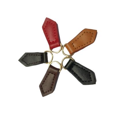 China Other Wholesale Zipper Puller Logo Garment Accessories Embossed Leather Zipper Factory Custom Made Leather Slider for sale