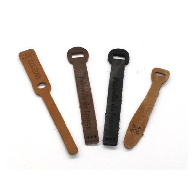 China Other Free Sample Factory Custom Embossed Logo Garment Accessories Genuine Leather Zipper Puller Leather Zipper Pulls Wholesale for sale