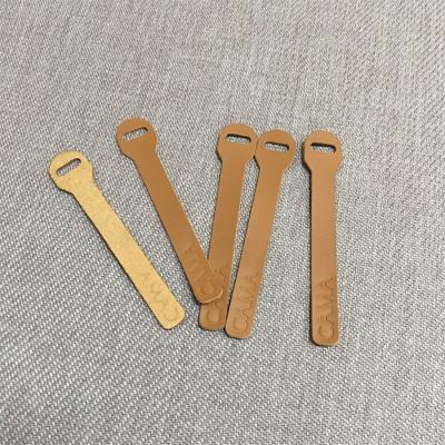 China Other Free Sample Wholesale Custom Engraved Logo Genuine Leather Zipper Pulls Garment Accessories Leather Zipper Puller For Clothing for sale