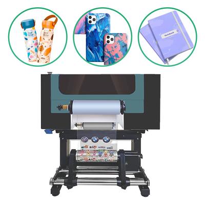 China Dubbele koppen I3200 UV-printer Roll To Roll UV Dtf sticker printer met lamineerder Te koop