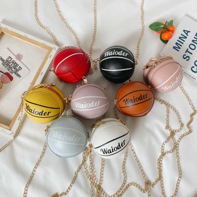 China New designer fashion mini basketball shoulder shape ladies handbag basketball purses and purses graffiti round bags for sale