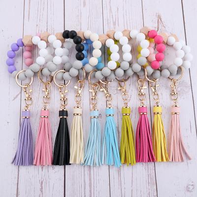 China Wholesale Custom Wooden Bracelet Eco-Friendly Beads Key Chain Bracelets Bangle Bracelets Beads Keychains Silicone Leopard Key Chain Eco-Friendly For Women Girls for sale