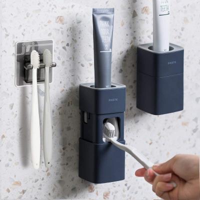 China Simple Modern Automatic Toothpaste Squeezer Cartoon Wall Mount Holder for Dentaltube Toothpaste Anti-dust Squeezer for sale