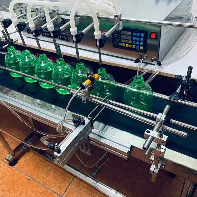 China Hot Sale 2021 New Product Food Liquid Soap Filling Machine Automatic Lotion Bottle Covering Detergent Filler for sale