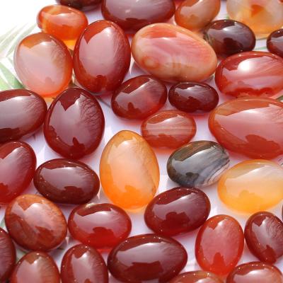 China Europe Highly Polished Carnelian Crystal Tumbled Stones For Home Natural Red Decoration for sale