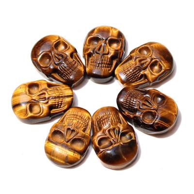 China Europe Wholesale Hand Cut Tiger Eye Crystal Skull Small Natural Crystal Pendant for sale