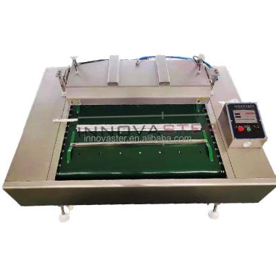 China Food Packaging Made 500 KG Automatic Continuous Rolling Belt Vacuum Packaging Machine for sale