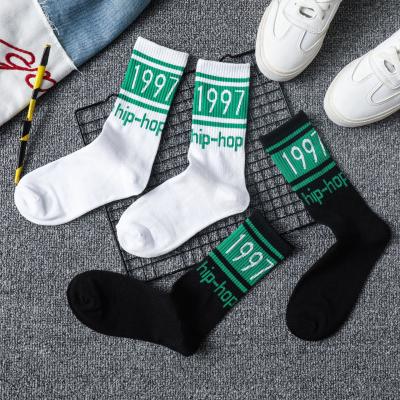 China Custom Design QUICK DRY Logo Cotton No Minimum Order Clean Fashion Embroidery Jacquard Men Sports Crew Short Sock for sale