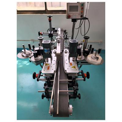 China Hot Selling Self Adhesive Label CLOTHING Automatic Label Machine Horizontal Labeling Machine for sale