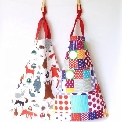 China Eco-friendly canvas cotton custom patterned children's apron children's art durable children's apron children's painting kitchen chef's apron for sale