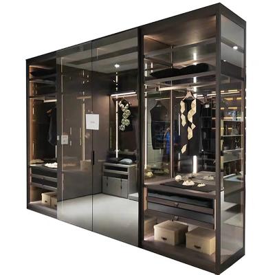 China Modern Aluminum Frame Glass Shelf Clothes Hanging Drawer Wardrobe Leather Covered Glass Wardrobe With Led Light for sale