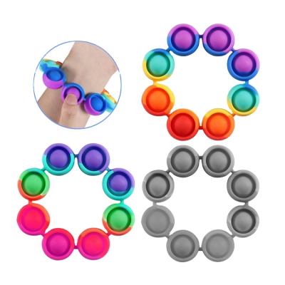 China Durable Relaxation Wristband Busy Toys Sound Wearable Push Bubble Hand Finger Press Silicone Wristband Sensory Toy for sale