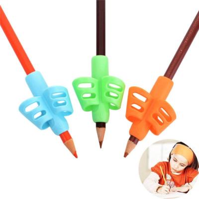 China Hold A Pen Correction Nontoxic Kids Pencil Holder Pen Writing Aid Grip Posture Correction Tools School Supplies for sale