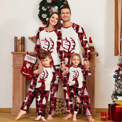 China Custom Designer Christmas Home Christmas Family Pajamas Logo Fashion Adult Kids Baby Print Winter QUICK DRY Amazon Pajamas Sets For Women And Girls for sale