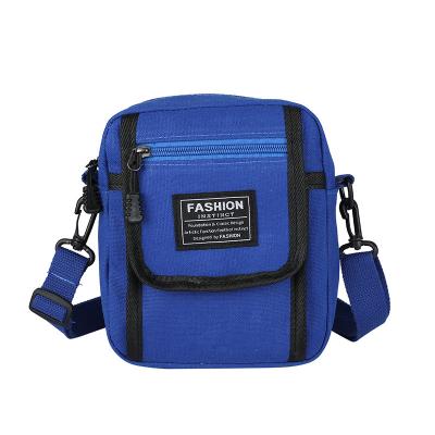 China Fasion New casual small shoulder bag men's couple one-shoulder canvas ins student lightweight mobile phone bag messenger for sale