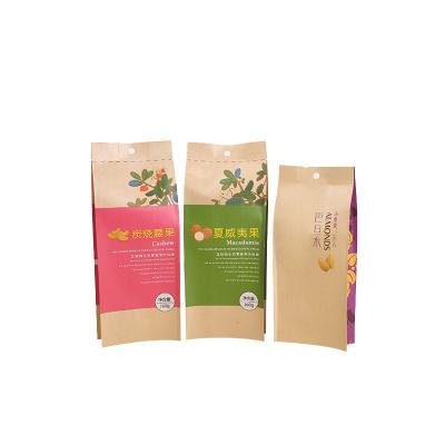 China 3 Layer Composite Material Stand Up Cereals Candies Nut Kraft Paper Packing Bag With Window for sale