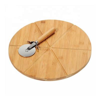 China Sustainable Sample Available Wholesale Eco Kitchen Best Grooved Bamboo Wood Pizza Serving Board for sale