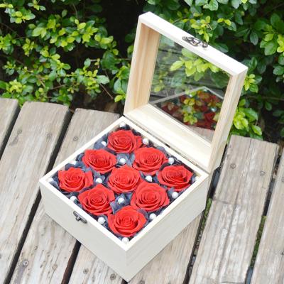 China Real Romantic Preserved UO Rose Eternal Flower Wedding Day Gift 9Pcs Red Long Lasting Preserved Roses In Glass Lip Wooden Box for sale