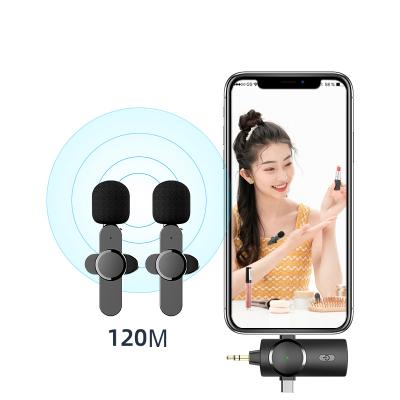 China Lavalier Microphone 2 in 1 Mini Headset Wireless Lapel Microphone Radio for Live Streaming Live Vibrato Type-C for Apple for sale