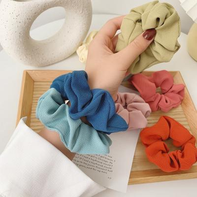 China Solid color hair band plaid solid color ponytail hair band cute soft Korean elastic hair scrunchies for sale