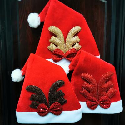 China Christmast Ornament Hot Selling Red Christmas Decorating Hats Merry Christmas Adults Kids Antlers Christmas Hat for sale