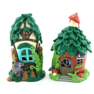 China Christmas Gift Popular Polymer Clay Christmas House Decorations With Led Lighted Cartoon Green Treehouse Party Table Top Indoor Decoration for sale