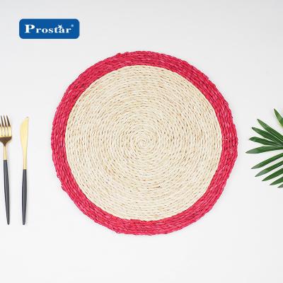 China Viable Wholesale Braided Round Place Mat Natural Material Corn Husk Dining Table Mat for sale