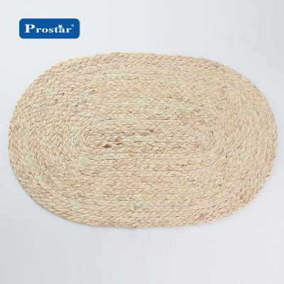 China Woven Natural Oval Shape Place Mat Corn Husk Materials Table Mat Viable for sale