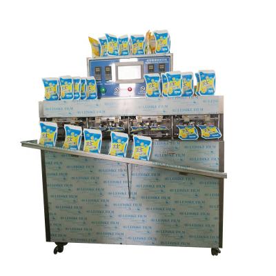 China Full Automatic Beverage Doypack Bags Plastic Packaging Bags Mango Juice Filling Packing Machine for sale