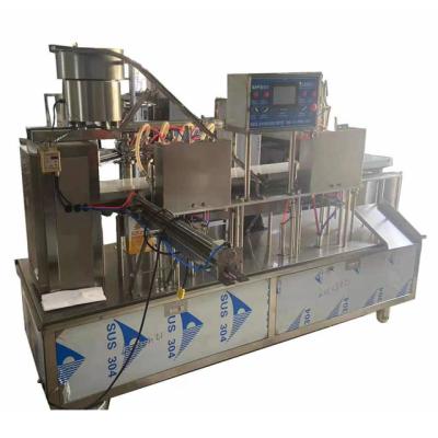 China Milk Up Pouch /spout Pouch Filling Packing Machine High Speed ​​Strawberry Juice Capping Rack With Cap Beverage Filling Packing Machine for sale