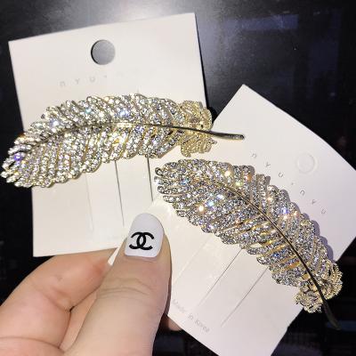 China Fashion Environmental Friendly Hot Faux Stone Leaves Feather Brooches Clothes Sweater Corsage Pins Brooch Pins Enamel Pin Brooches For Women Wholesale for sale