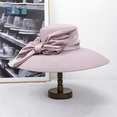 China Plush Winter Lady Elegant Large Bow 100% Wool Felt Wide Brim Pink Felt Flat Top Fedora for sale