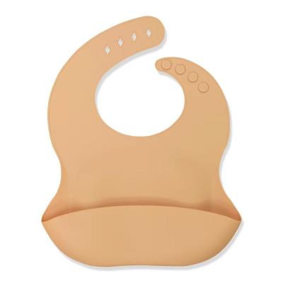 China New Design Sublimation Silicone Baby Pink Eco-friendly Wholesale Hot Selling Bib Beige Waterproof Baby Bibs for sale