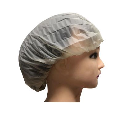 China Sustainable Bathroom The Disposable Off The Tape Transparent PE Shower Cap for sale